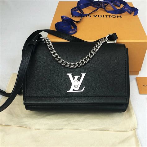 louis vuitton purse lock|Louis Vuitton tote with strap.